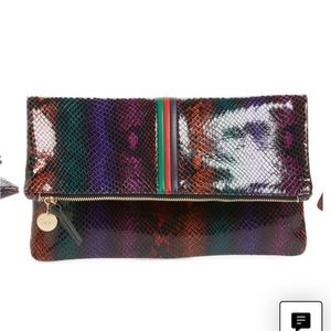 Clare V snake embossed leather foldover clutch in rainbow python.